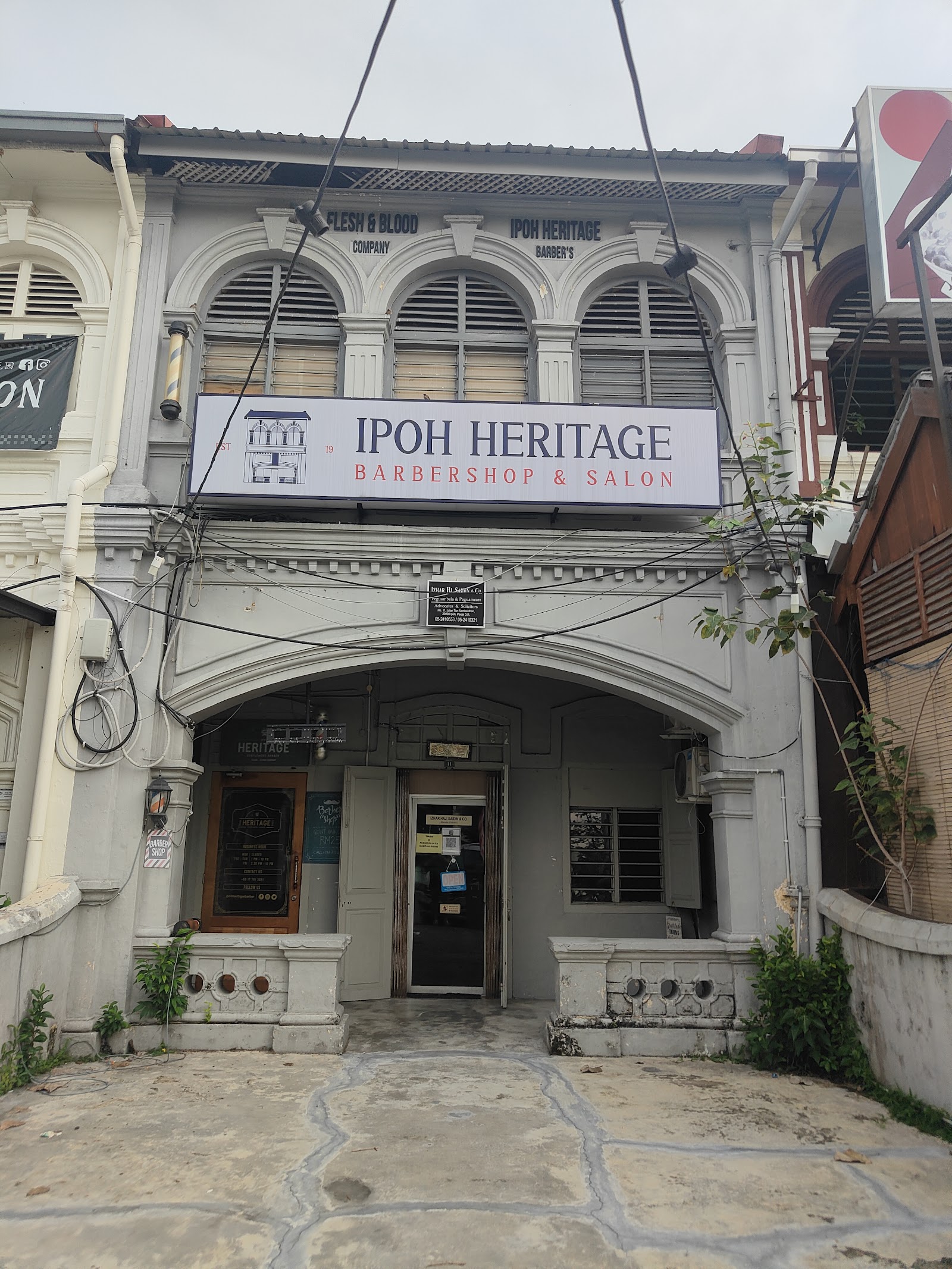 Ipoh Heritage Barber Shop storefront and signage on Jalan Tun Sambanthan